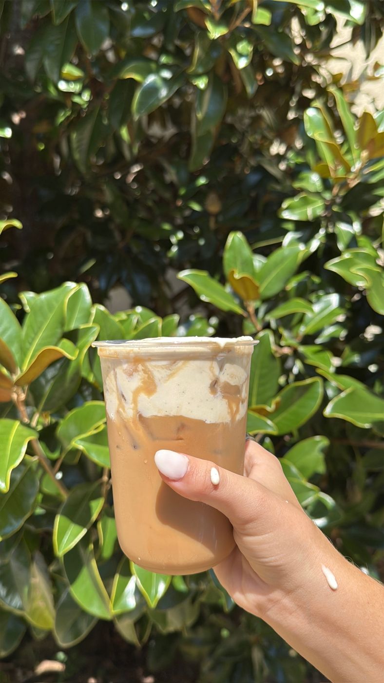 An iced Salted Vanilla Bean Latte with vanilla bean cold foam